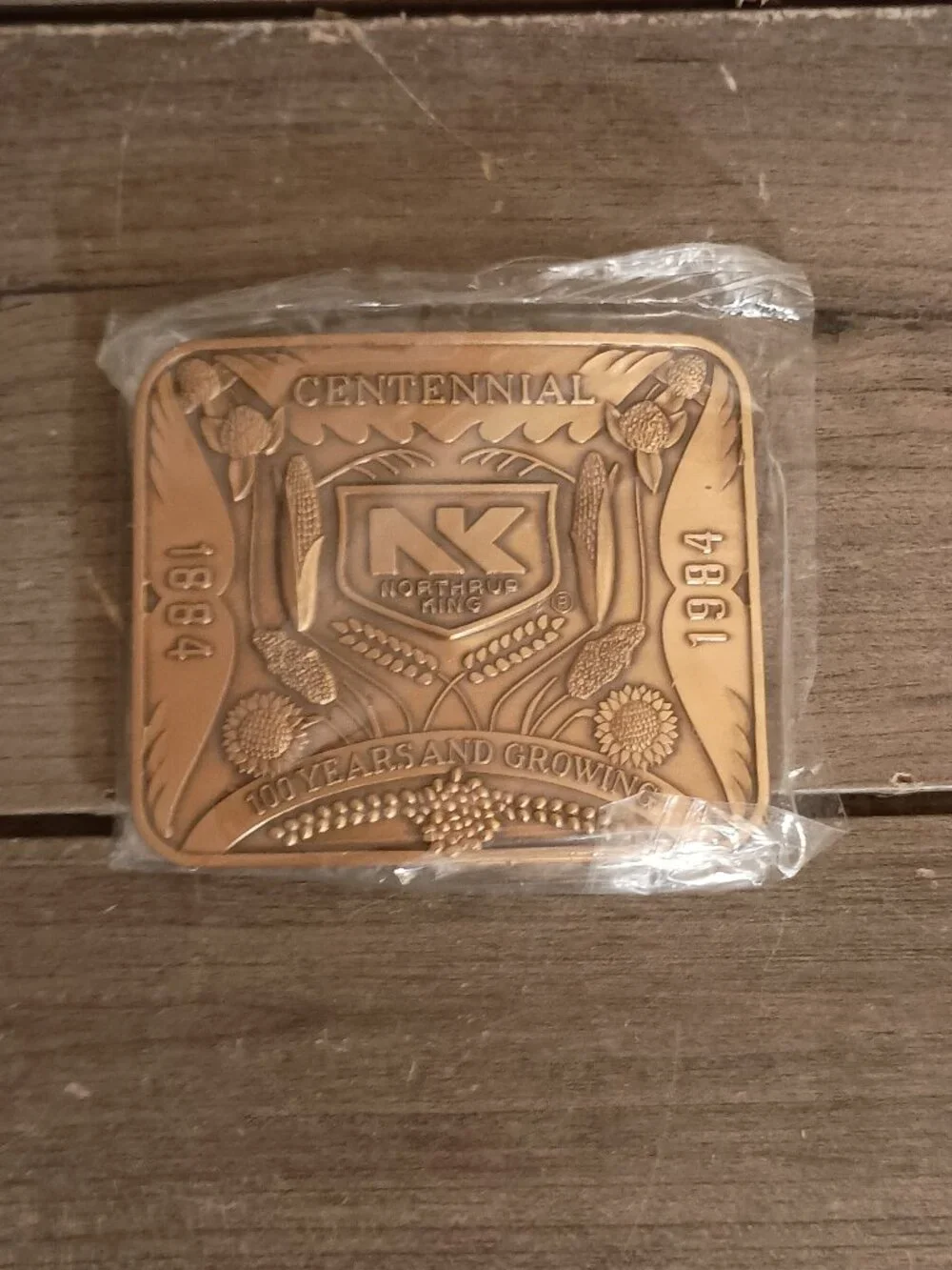 Vintage Northrup King Centennial 1884-1984 Belt Buckle Brand New Sealed